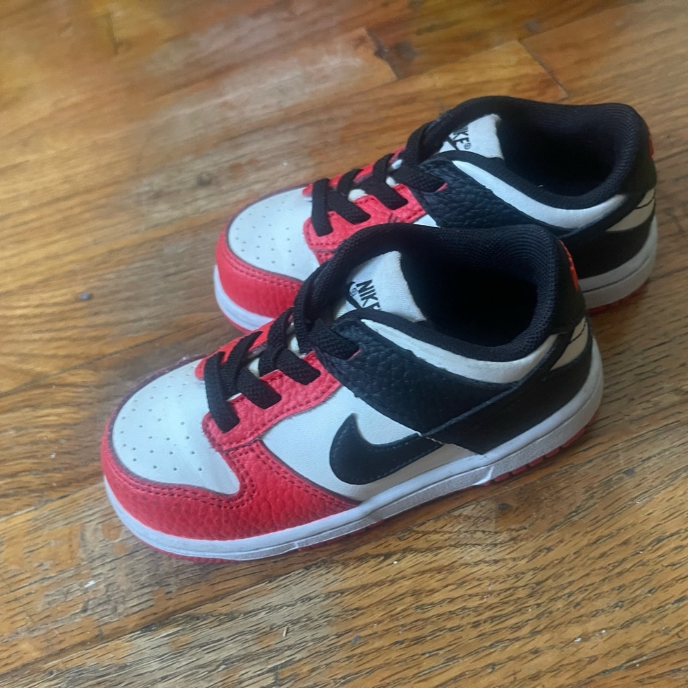 Black white and red toddler dunks